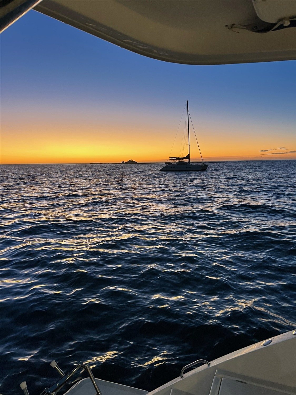 Private charter boat at sunset off Tamarindo, Costa Rica